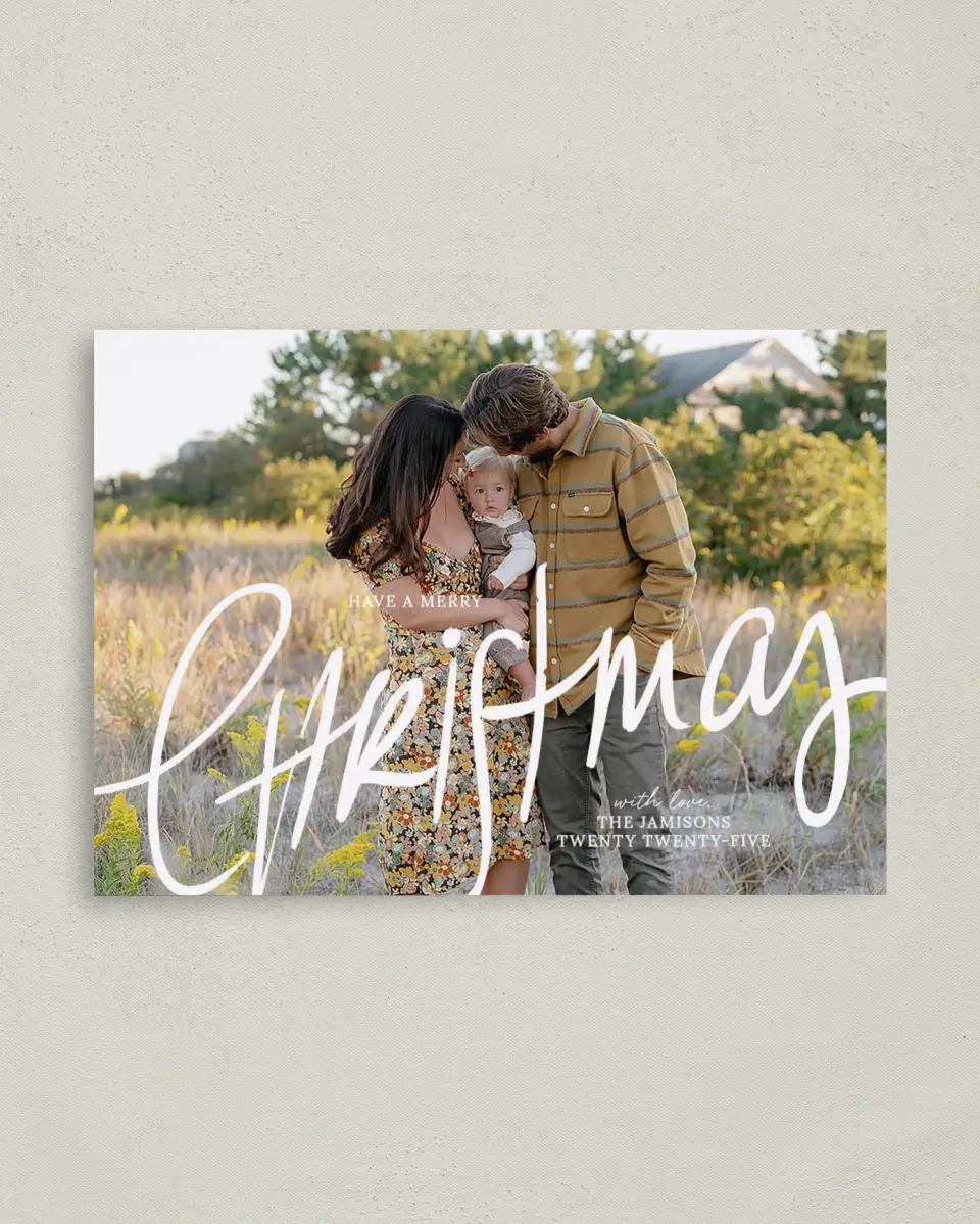This is a 4" x 5.6" Christmas Card called Celebrating Christmas printed in full color with Rose Gold foil on Soft Suede (coated) paper