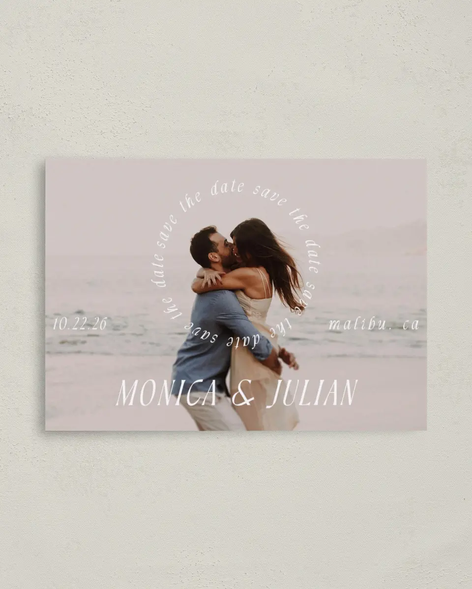 This is a 4" x 5.6" Save the Date Postcard called Crashing Love printed in full color on Soft Touch Finish paper