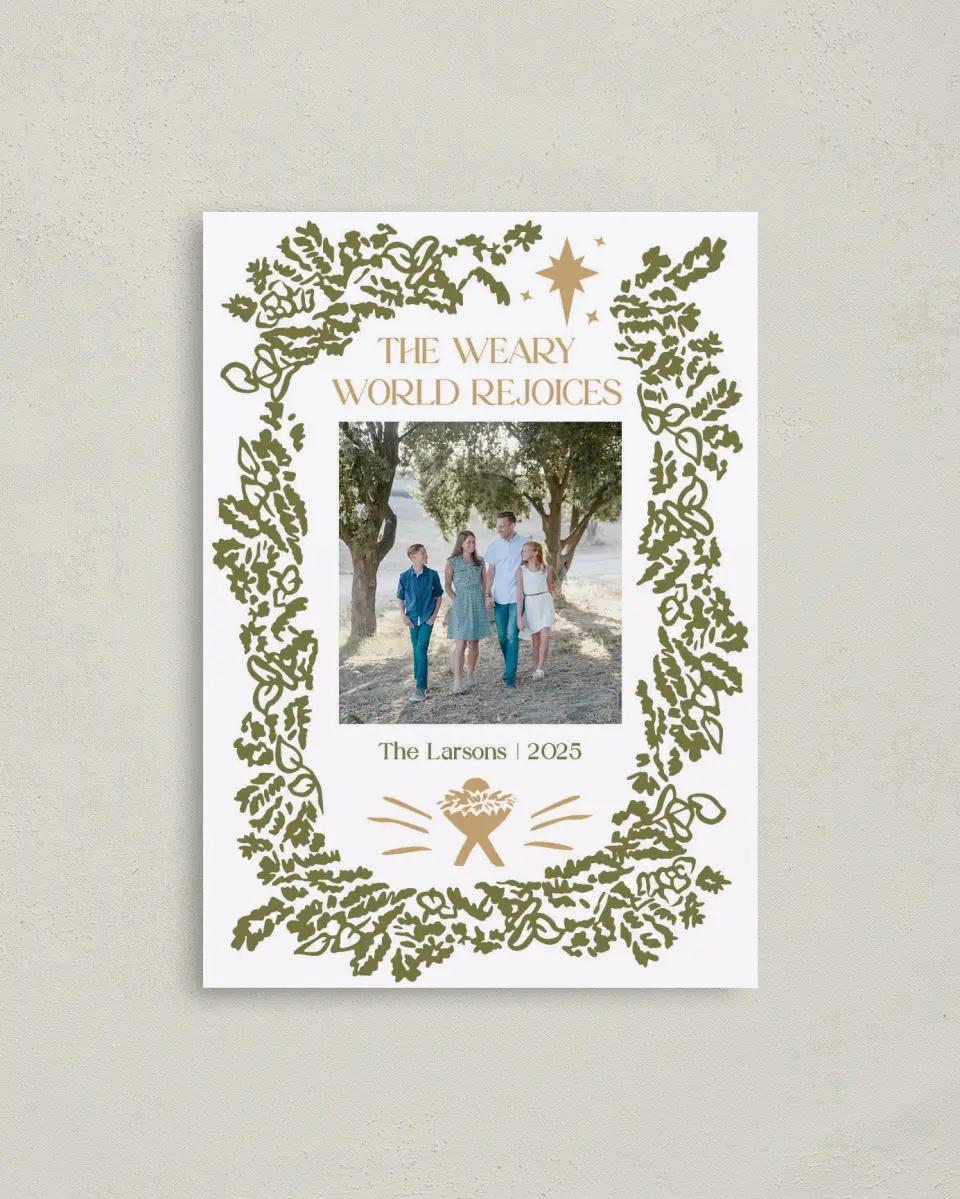 This is a 4" x 5.6" Christmas Card called Weary World Rejoices printed in full color with Rose Gold foil on Soft Suede (coated) paper