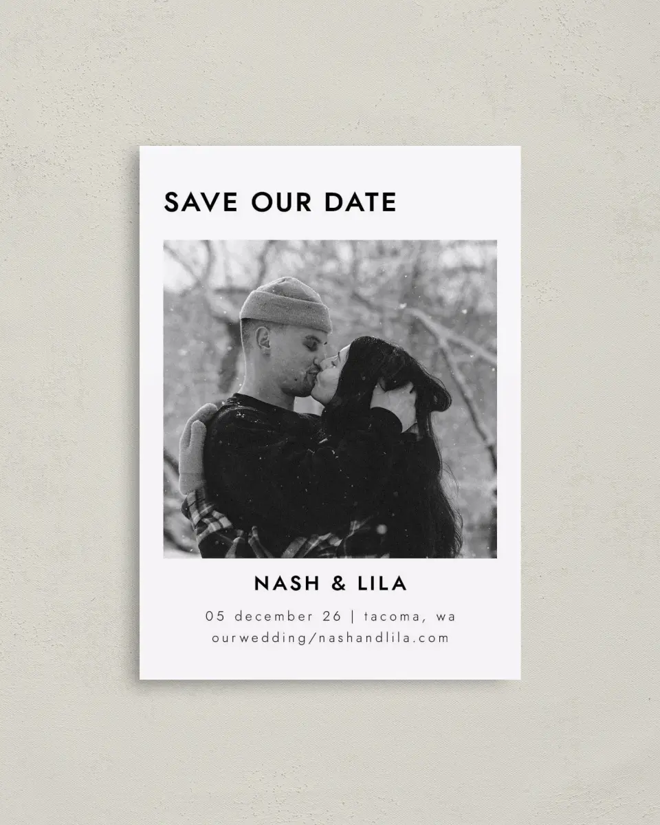 This is a 4" x 5.6" Save the Date Postcard called Snowy Kisses printed in full color with Gold foil on Soft Touch Finish paper
