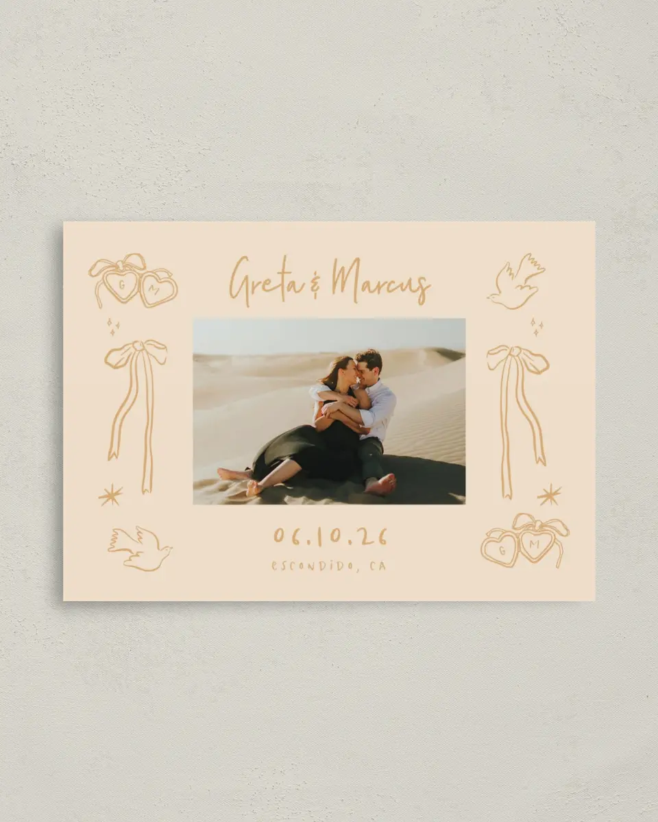 This is a 4" x 5.6" Save the Date Postcard called Loving Whimsy printed in full color with Gold foil on Soft Touch Finish paper