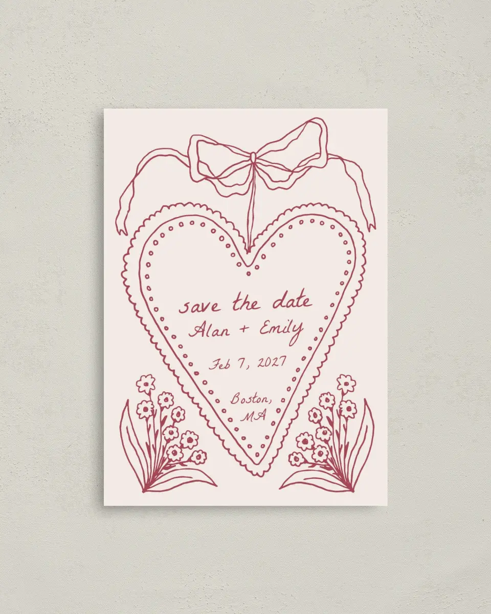 This is a 4" x 5.6" Save the Date Postcard called Heart On My Sleeve printed in full color with Gold foil on Soft Touch Finish paper