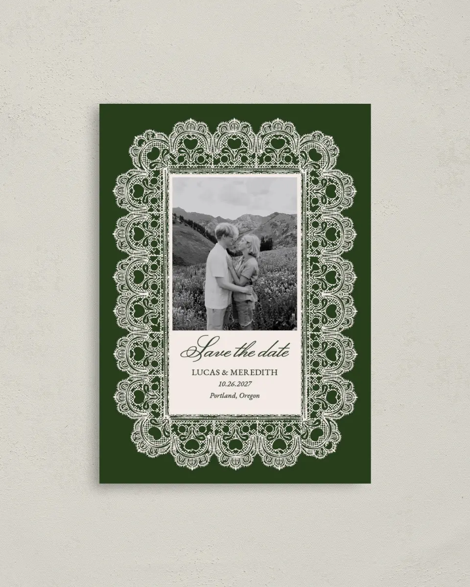 This is a 4" x 5.6" Save the Date Postcard called Lace Border printed in full color with Gold foil on Soft Touch Finish paper
