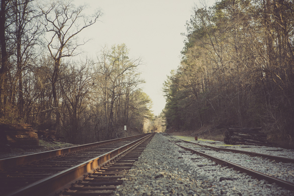 railroad tracks in country engagement photos