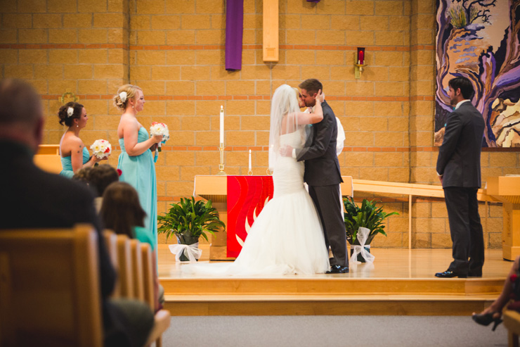 bride and groom wedding kiss