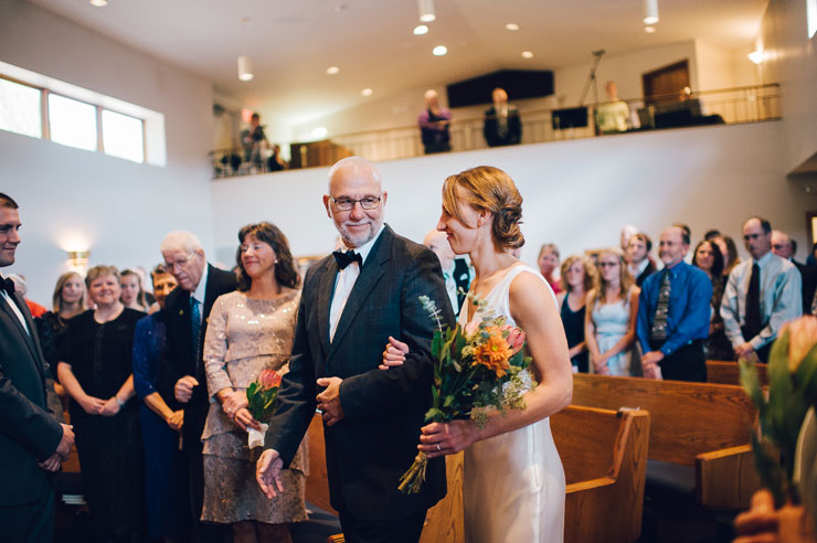 Father walking bride down the aisle