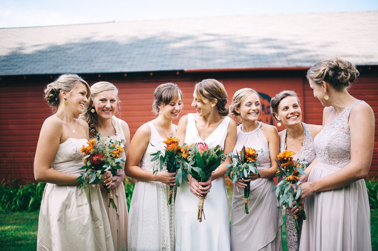 Bridesmaids dressed in mix and match neutral wedding colors
