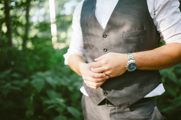 Groom wearing brown suit