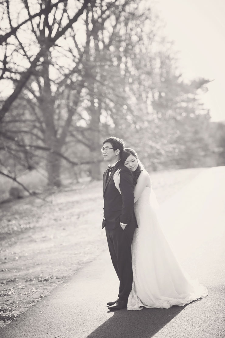 Head on groom's shoulder