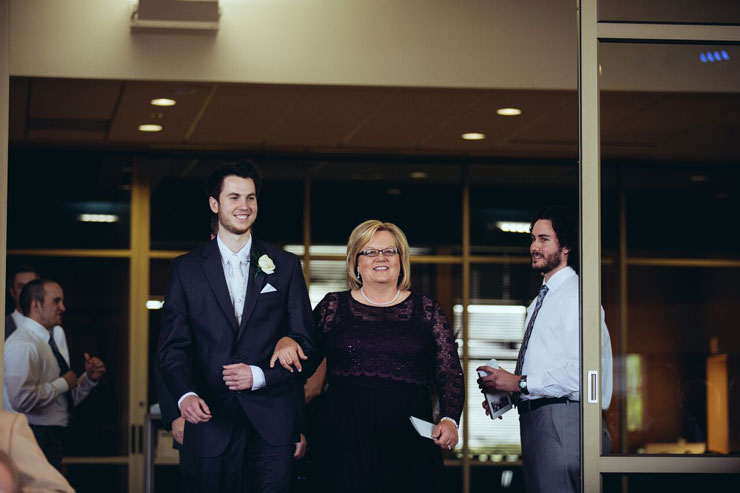 Groom-walking-mom-down-the-aisle